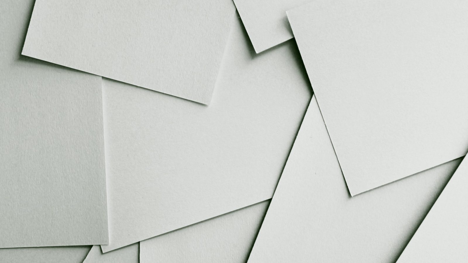 Stack of overlapping white paper sheets