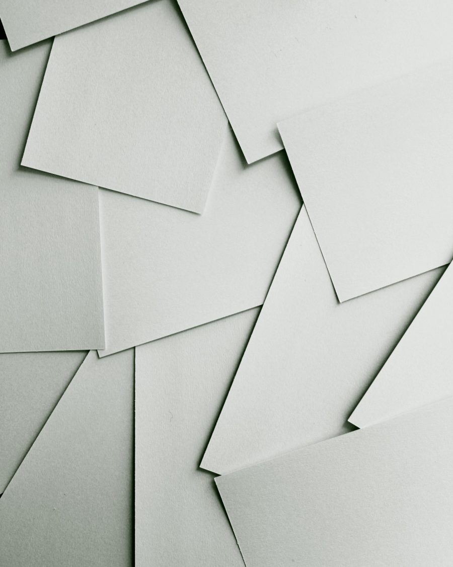 Stack of soft-white eggshell-finish paper sheets